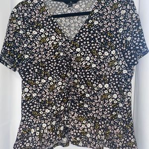 V-neck cinched floral blouse